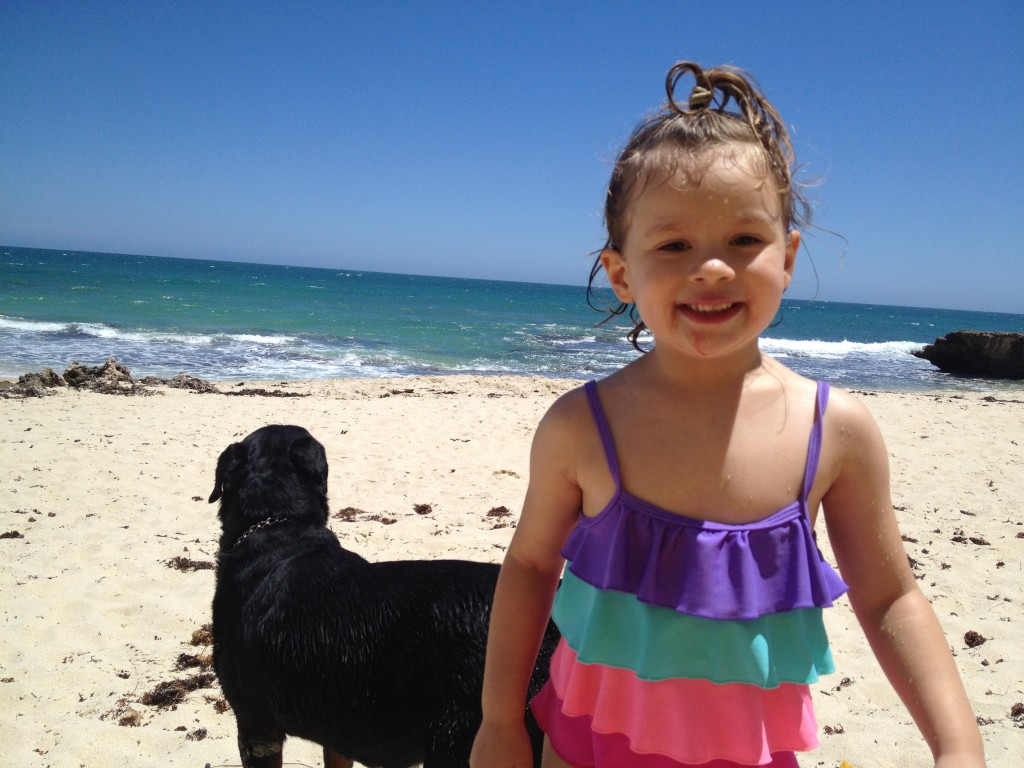 Bella and Atticus bonding on the beach